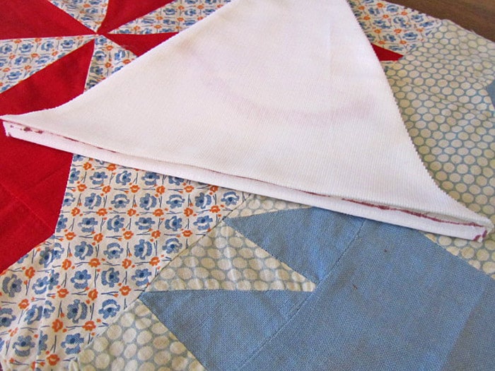 Folded and pressed triangle for bunting.