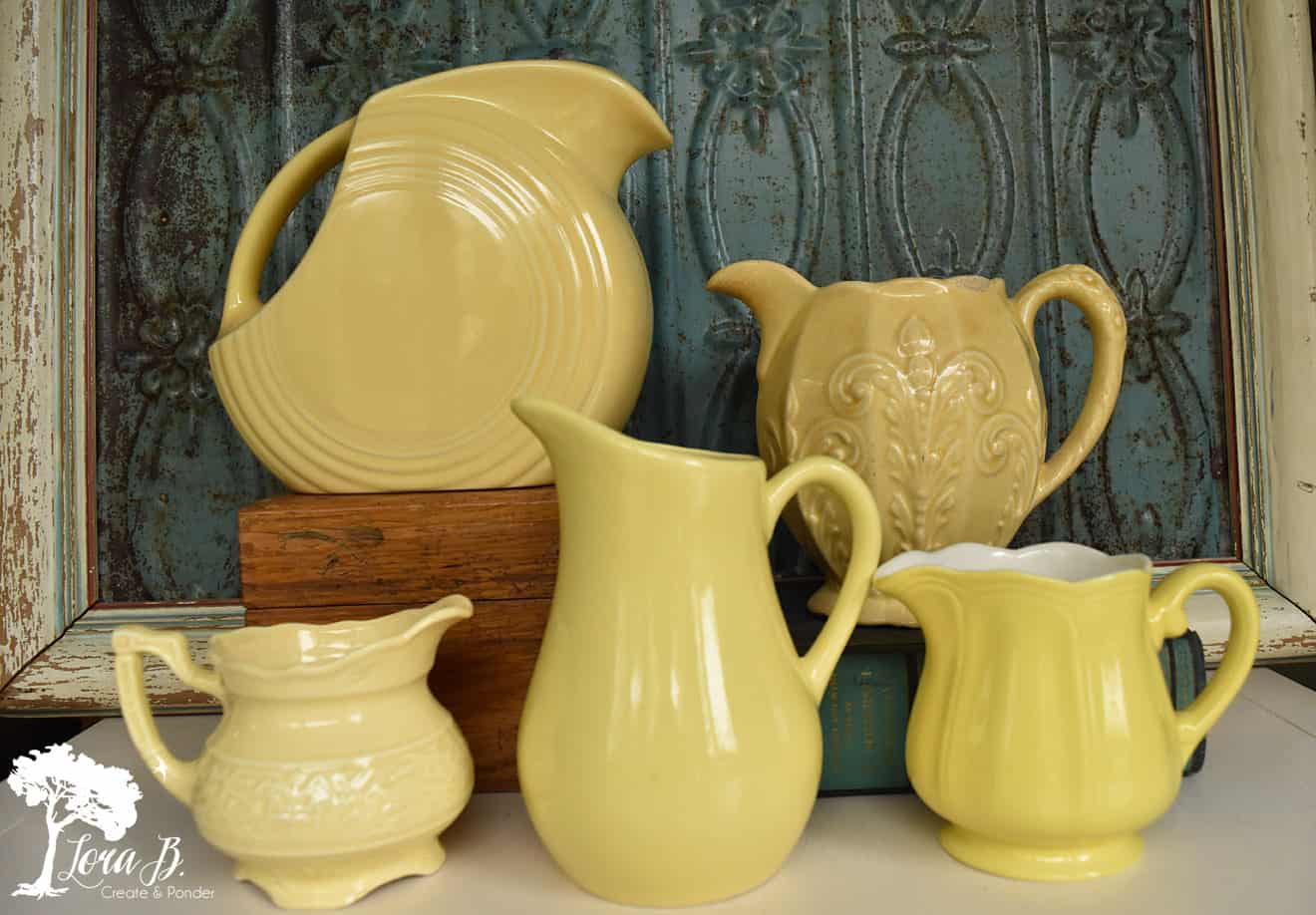 Collection of vintage yellow pitchers.