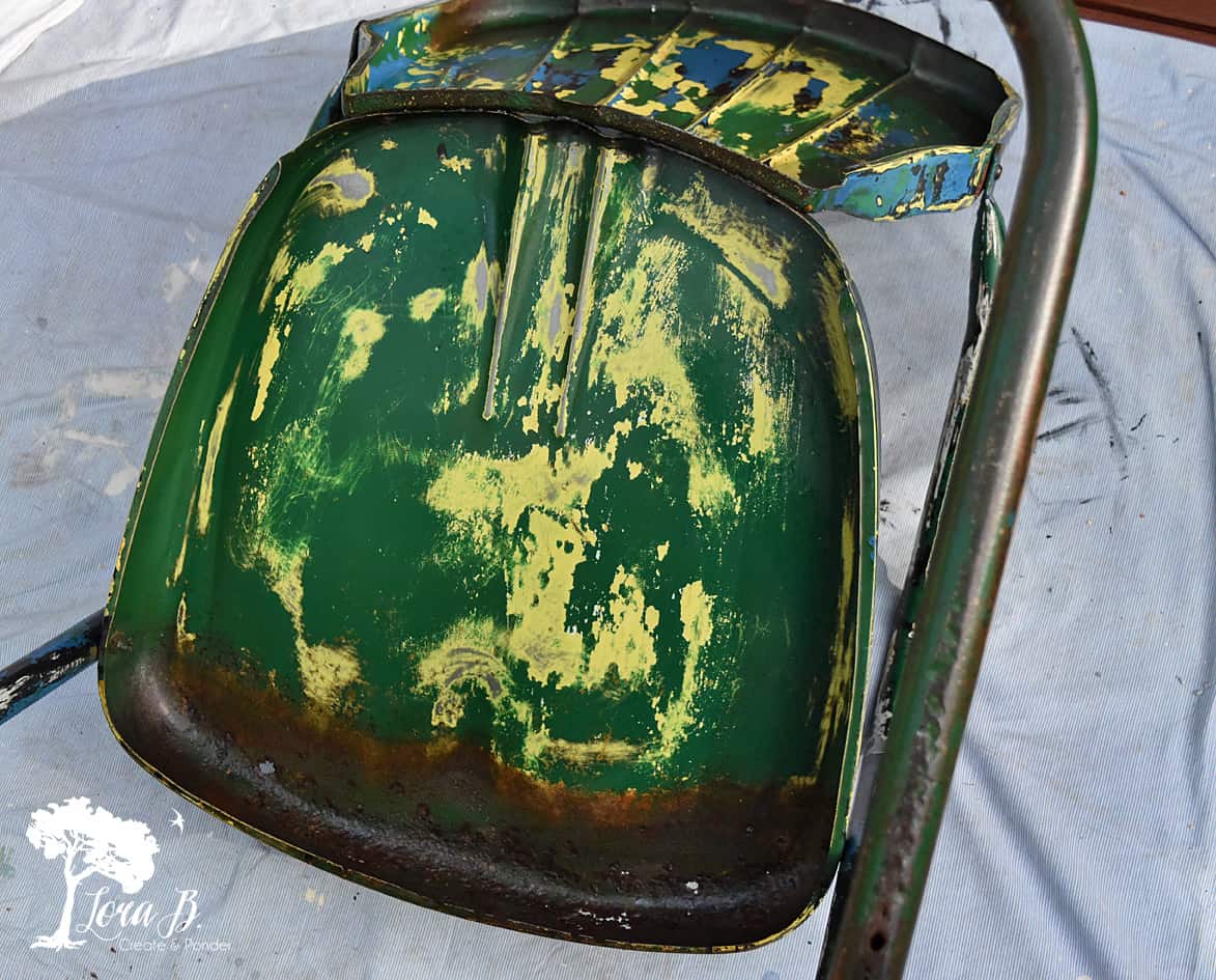 Vintage metal chair upside down.