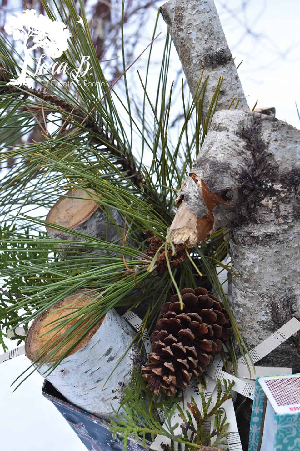 Birch logs in a vintage coal bucket