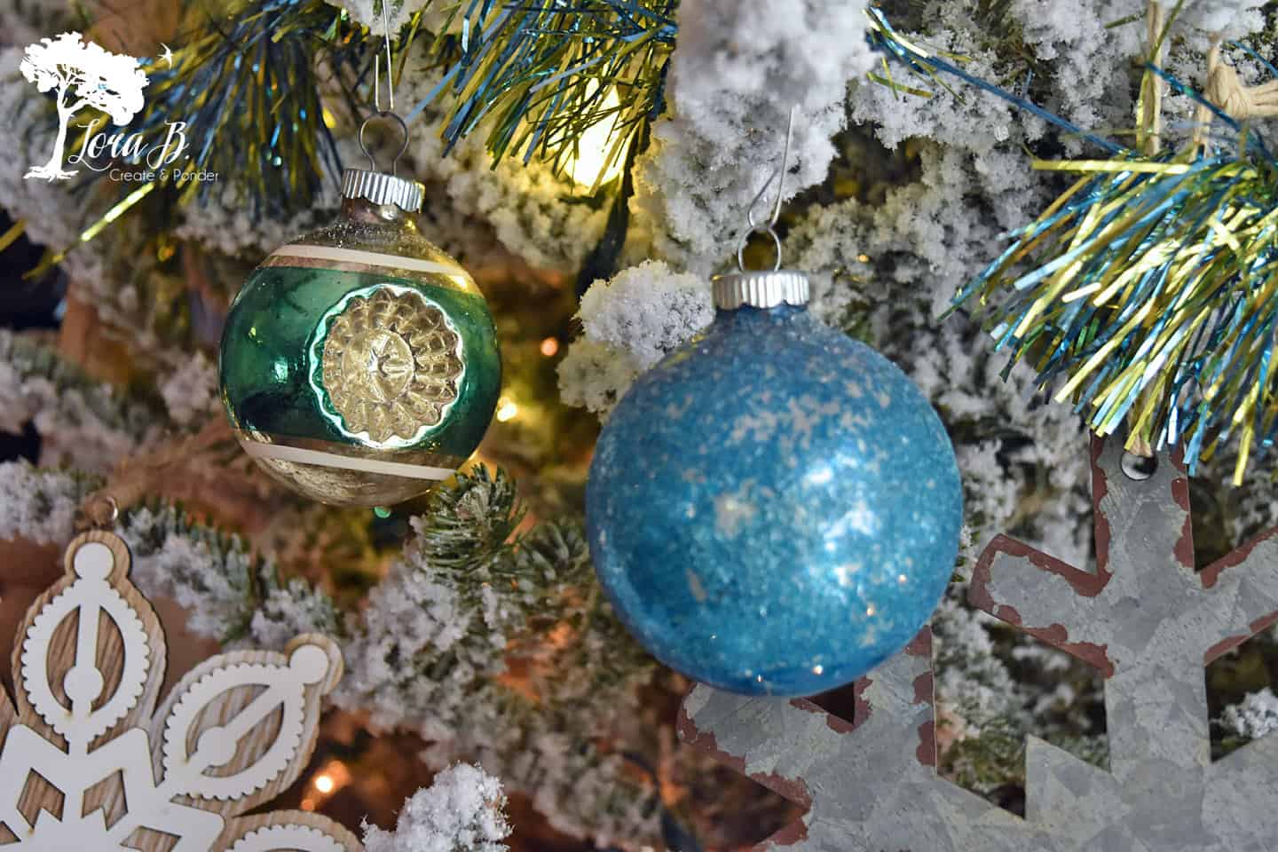 Vintage Shiny Brite ornaments on a Christmas tree.