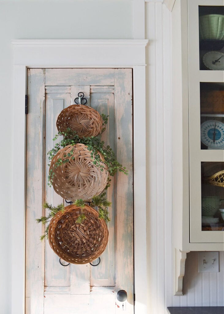 Thrifted vintage baskets decorated on plate rack