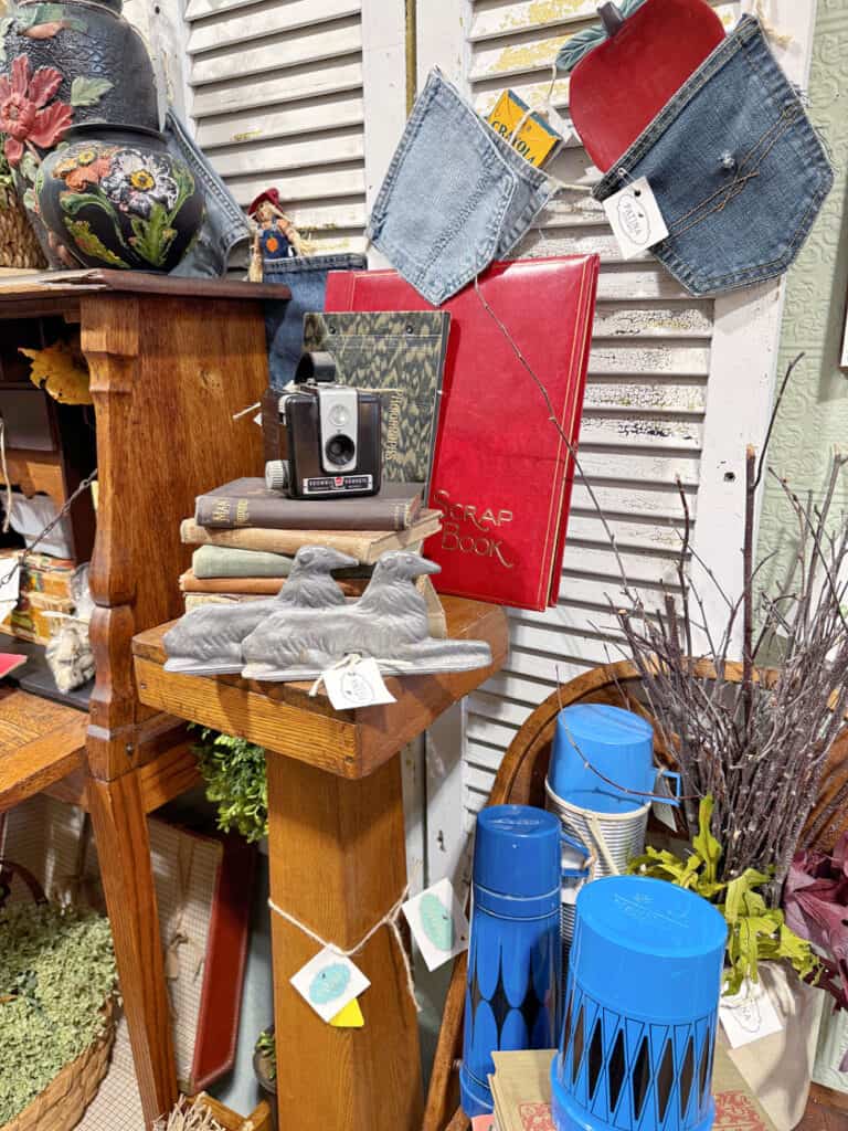 Vintage back to school display in antique store booth.