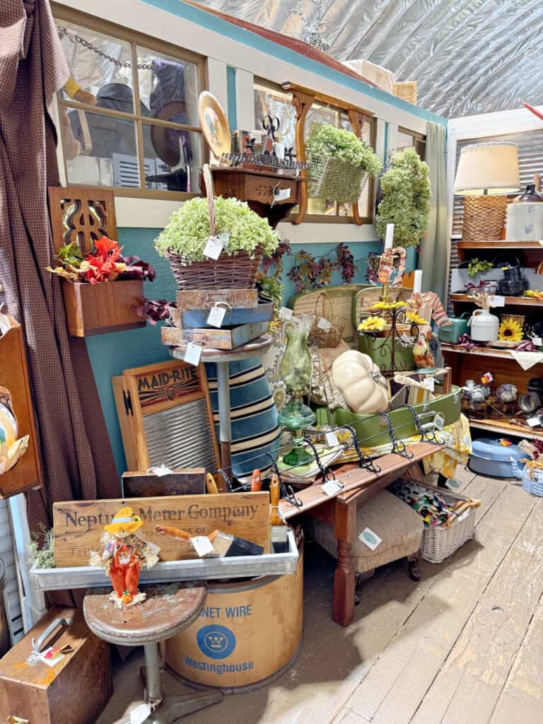Antique booth filled with early fall treasures.