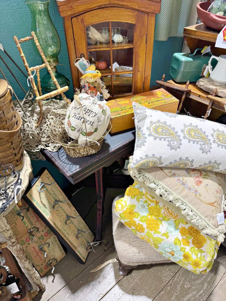 Fall display with vintage finds in antique booth.