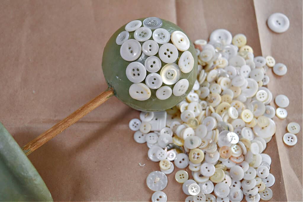 Making a vintage button topiary.
