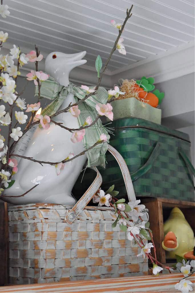 Picnic baskets as spring decor with duck.