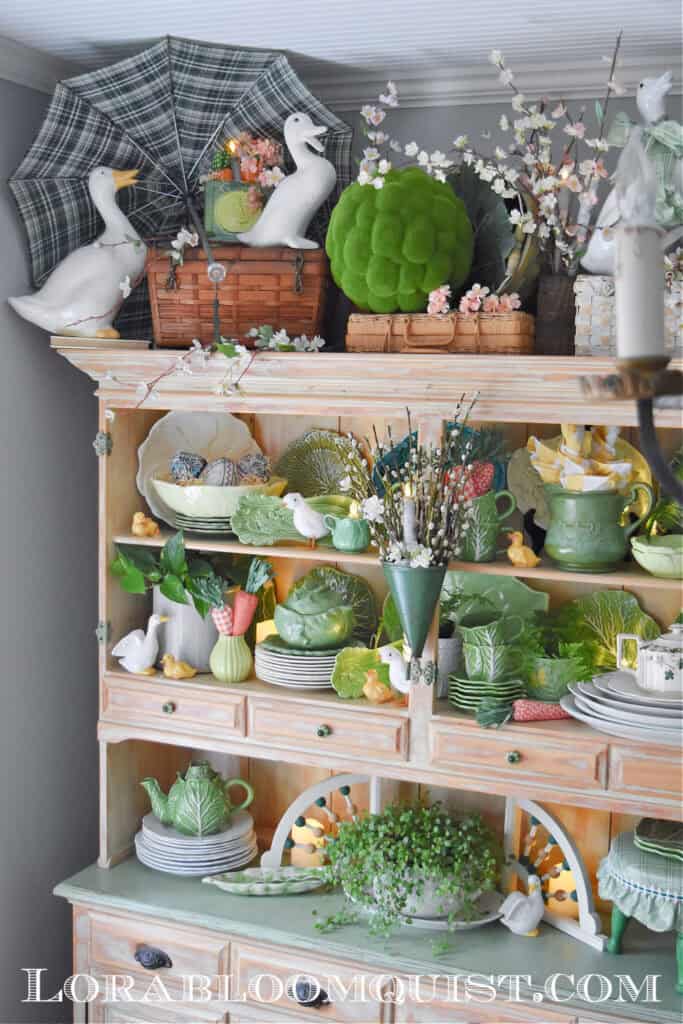 Spring hutch decor with cabbage ware.