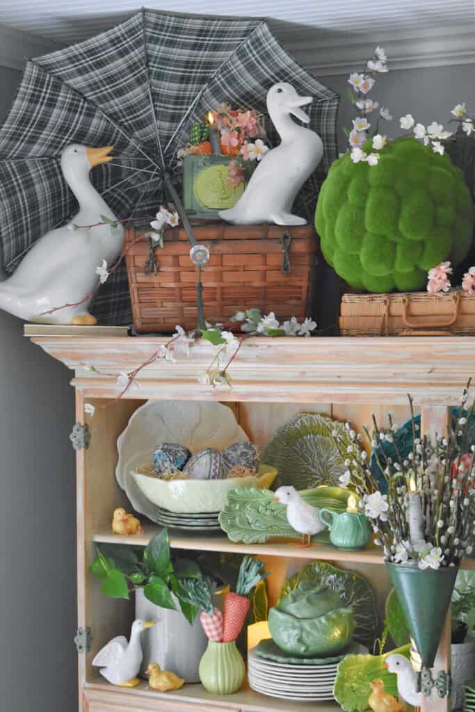 Spring hutch decor with cabbage ware.