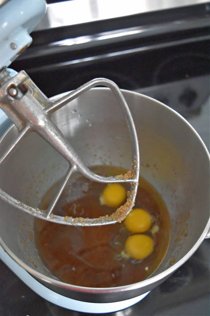 Mixing wet ingredients for homemade cake.