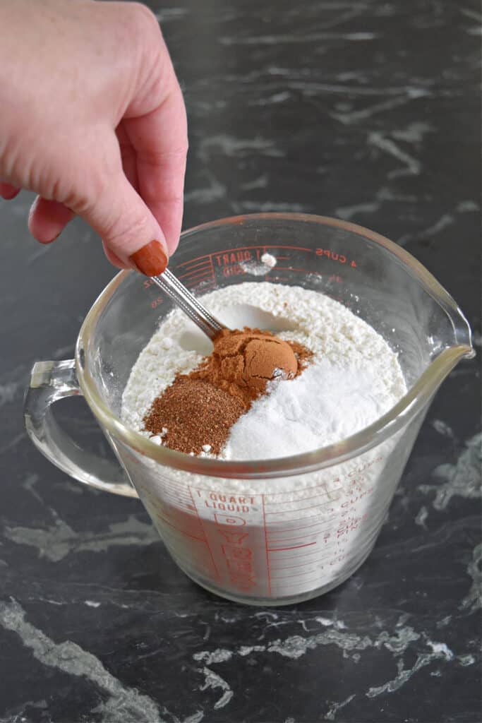 Whisking dry ingredients for cake.