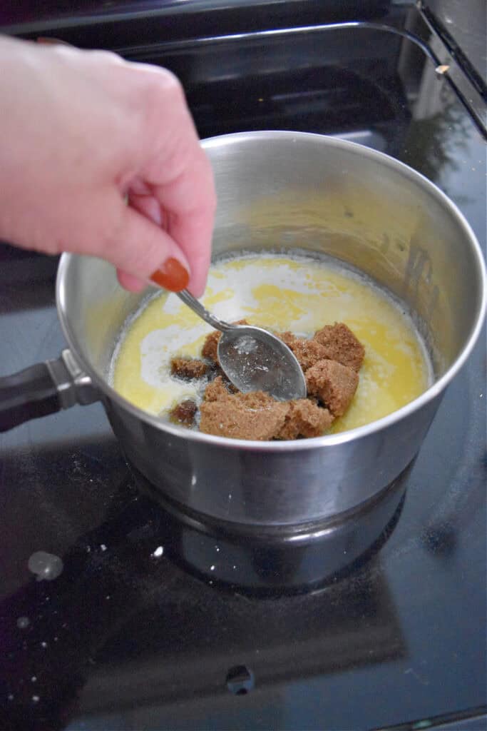 Making frosting for homemade cake.
