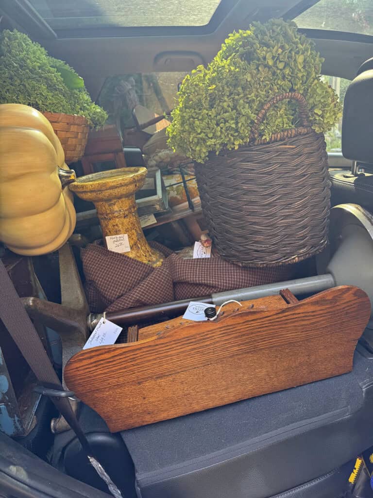 Fall decorating items loaded in car for antique booth.