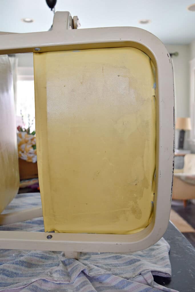 Reviving vintage metal chair.
