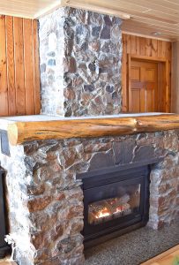 vintage cabin stone fireplace