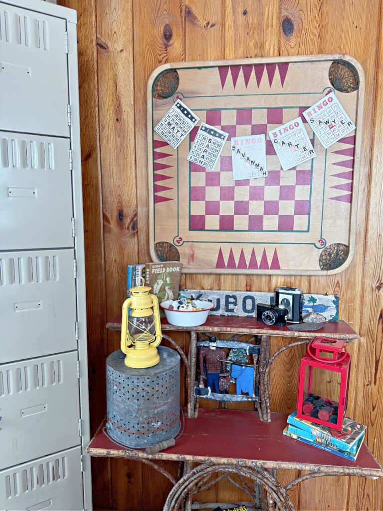 Old games and fishing gear as retro cabin decor.