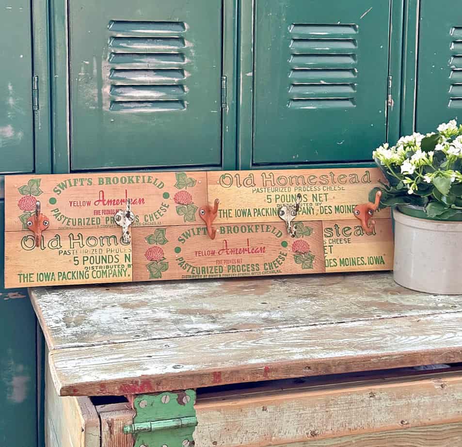 Vintage cheese box graphics get upcycled into nostalgic hooks.