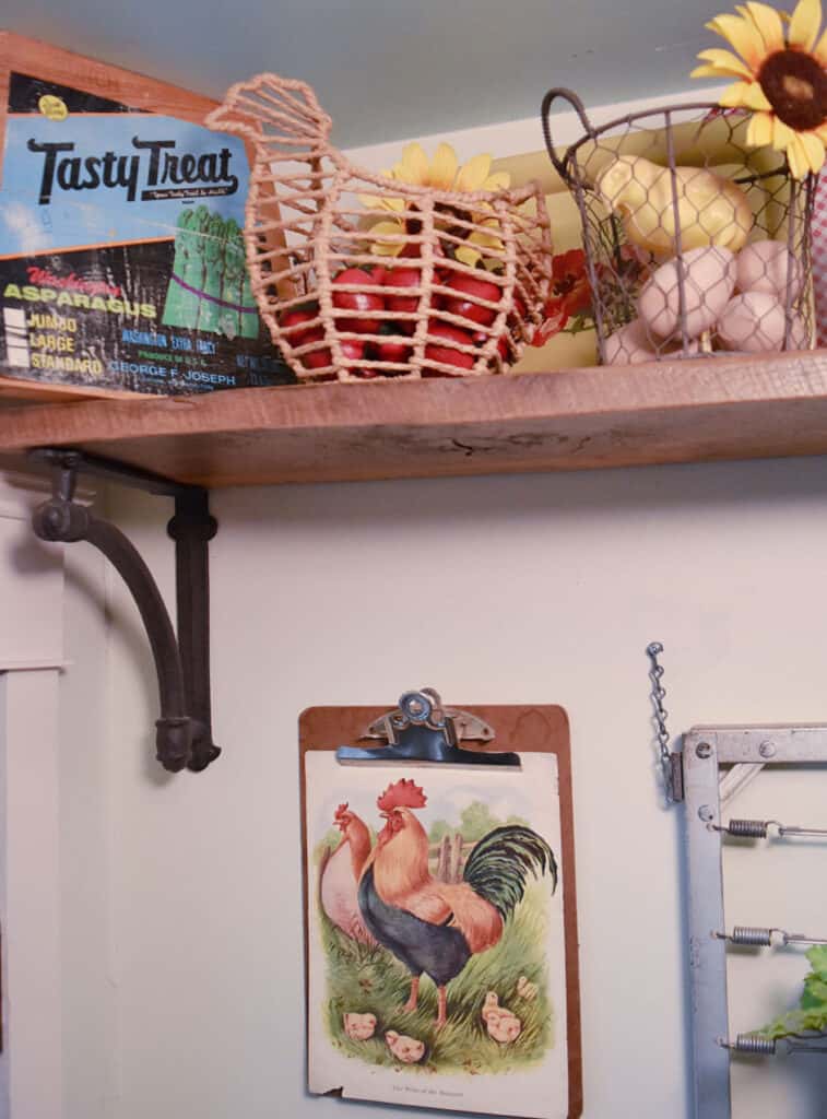 Farmhouse chicken themed shelf display.