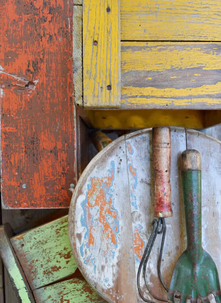 Collage of vintage chippy painted pieces in bright colors.