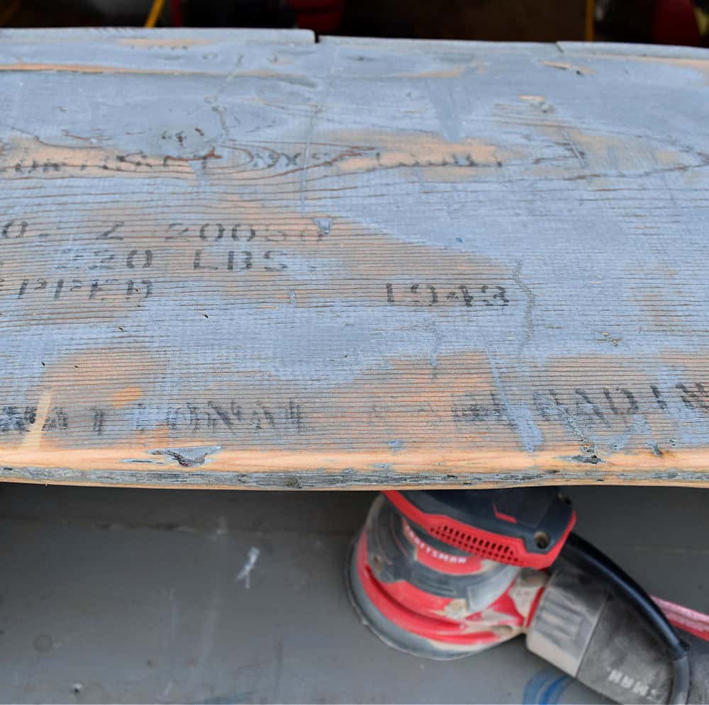 Orbital sander for vintage wooden crate.