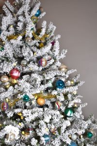 flocked Christmas tree with shiny brites