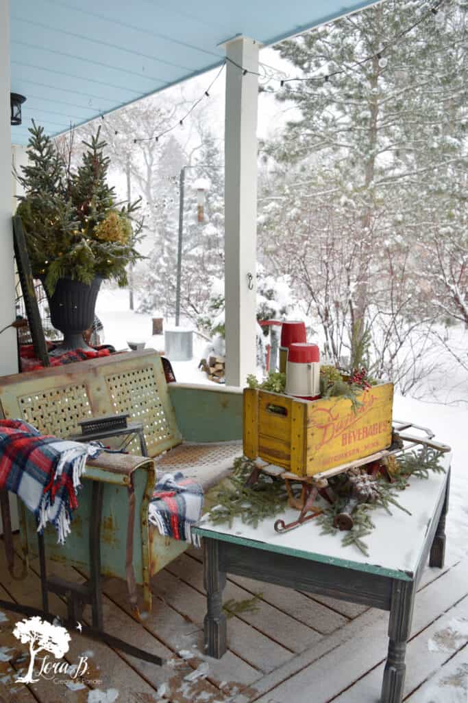 Vintage glider on winter porch