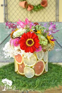 citrus and garden flowers arrangement