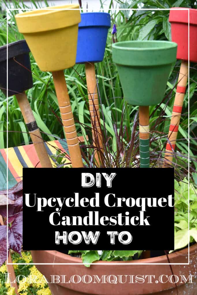 Upcycled croquet candlesticks as repurposed yard art.