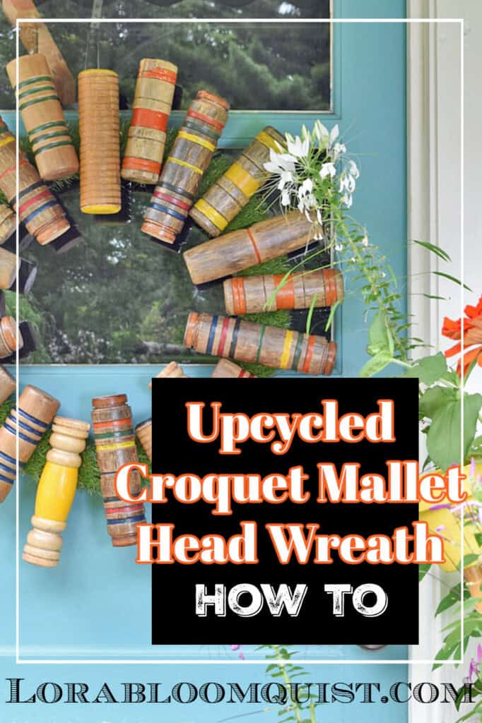 Upcycled croquet wreath on aqua door.