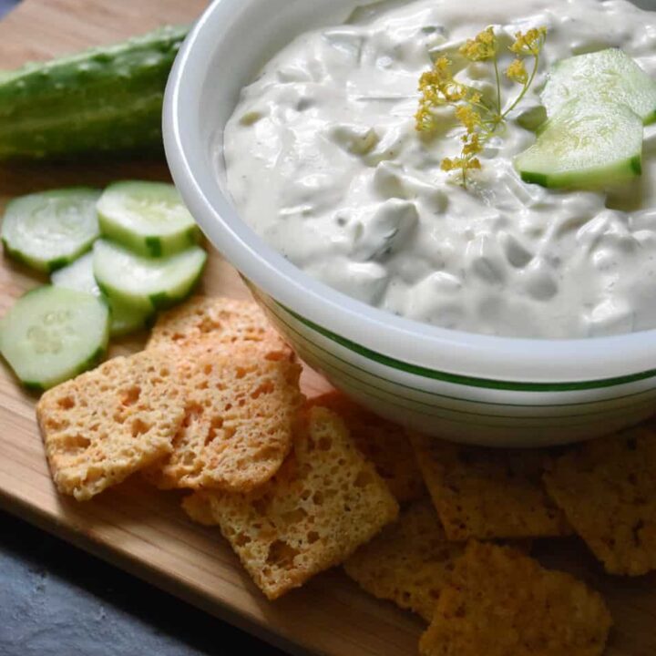 Dill Cucumber dip in vintage bowl, served with crackers.