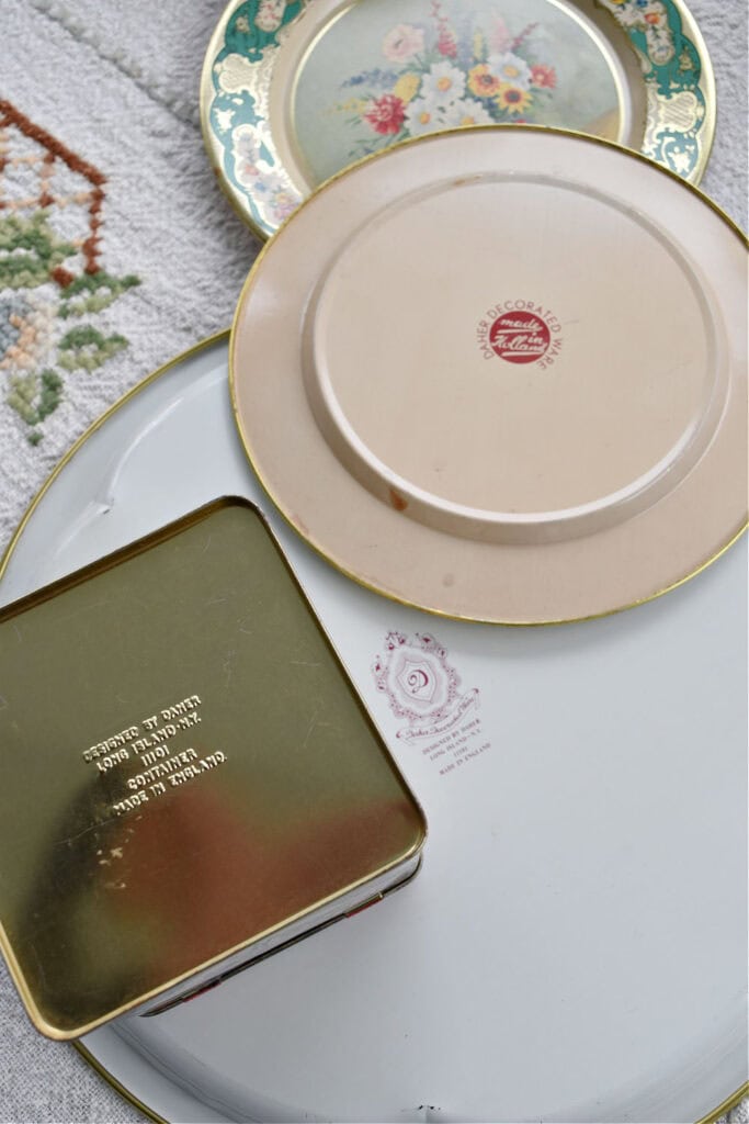 Daher floral tin tray trademarks on back.