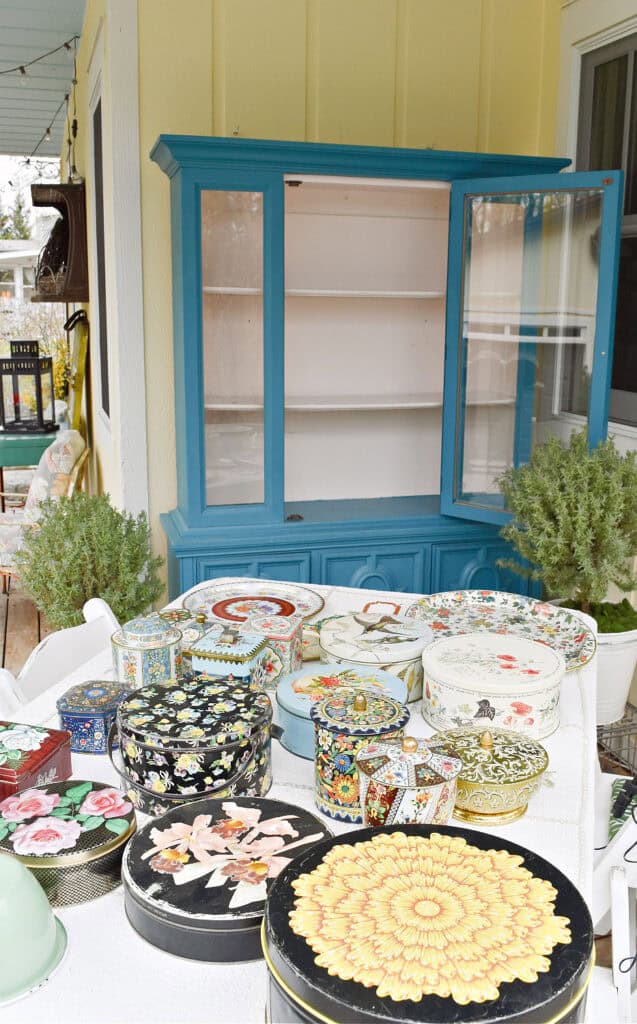 Aqua painted hutch on porch.