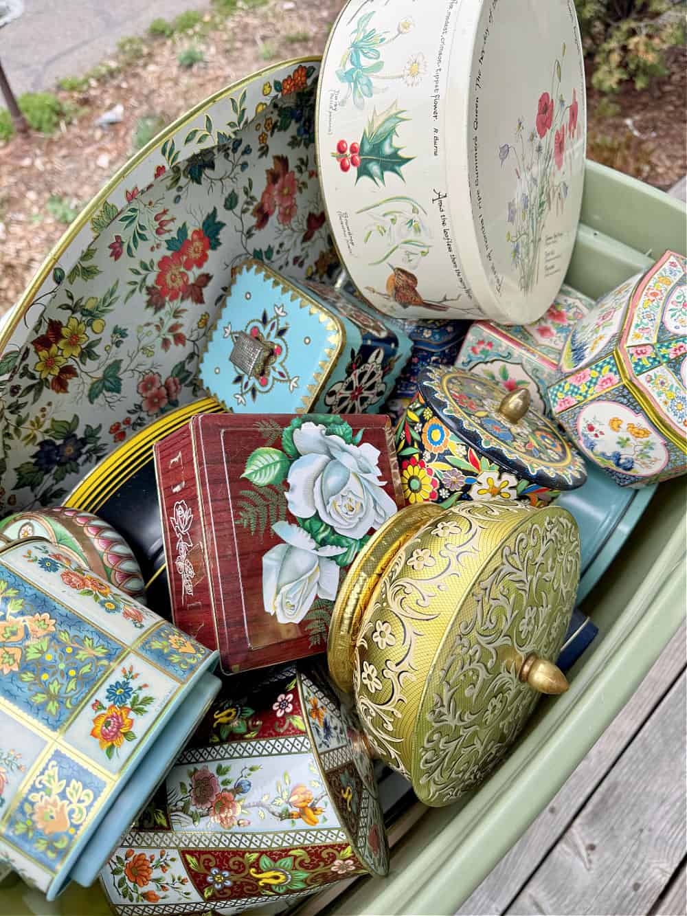 Vintage floral metal tin collection.