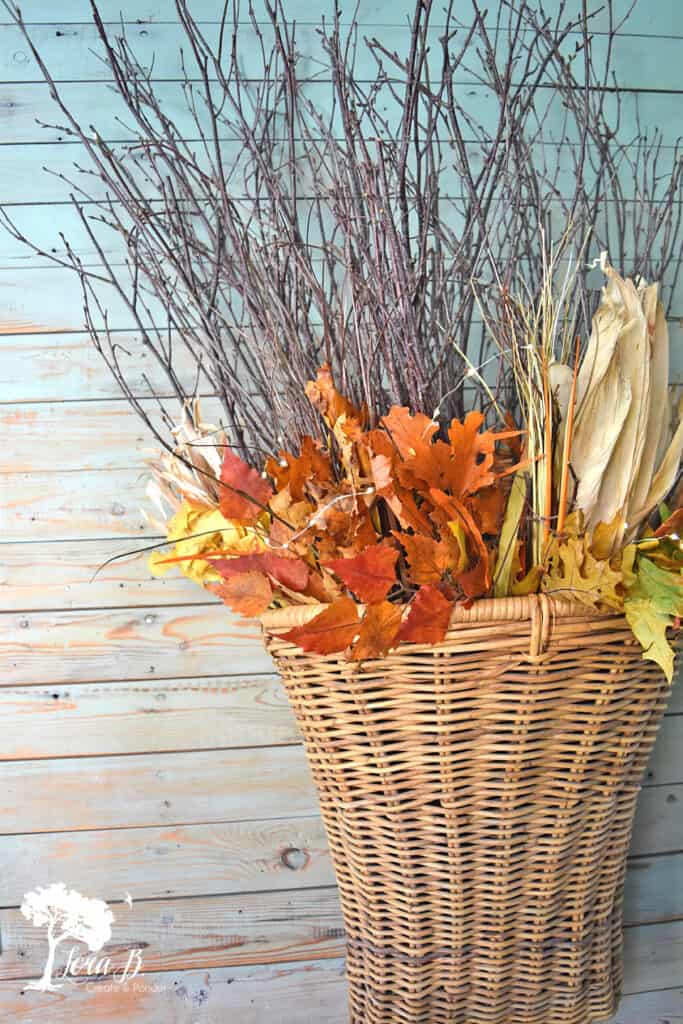 Branches in a basket can easily be transitional decor through the seasons.