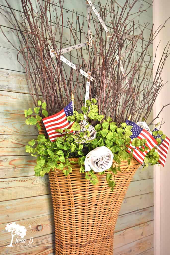Branches in a basket can easily be transitional decor through the seasons.