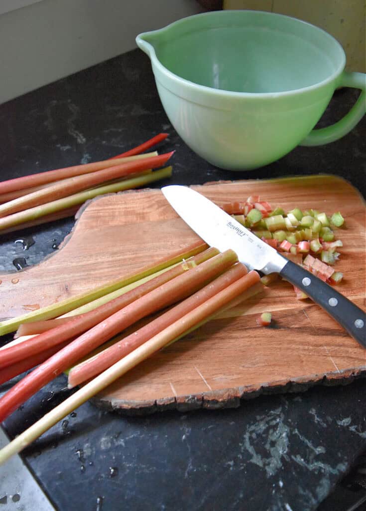 Cutting up rhubarb for dessert.