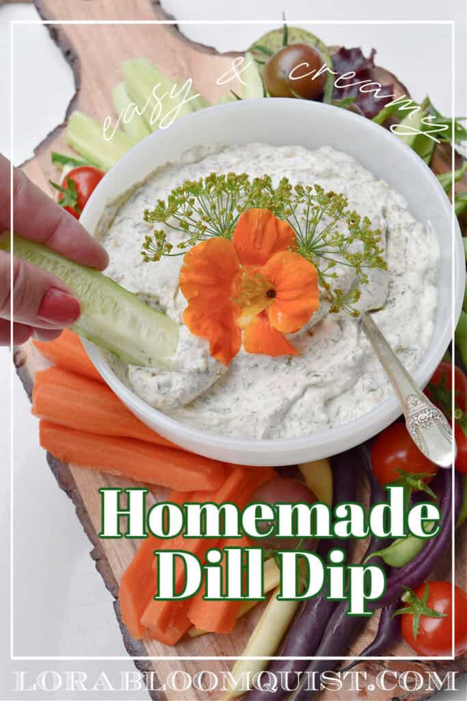 Homemade dill dip in white bowl with fresh veggies.
