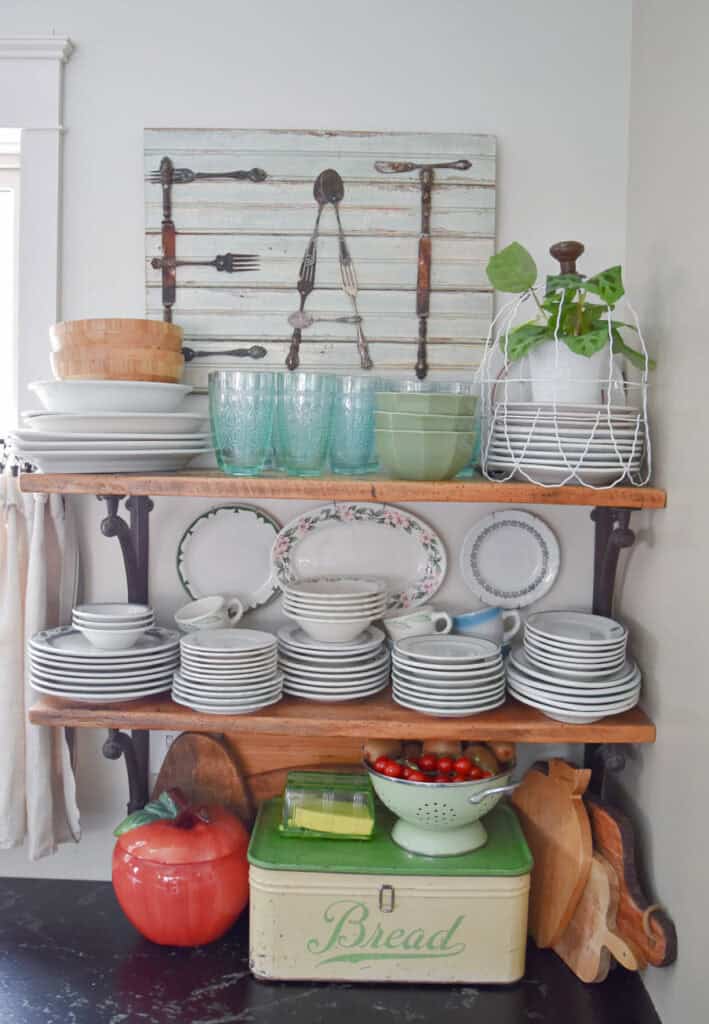 Kitchen open shelves with hotelware collection.