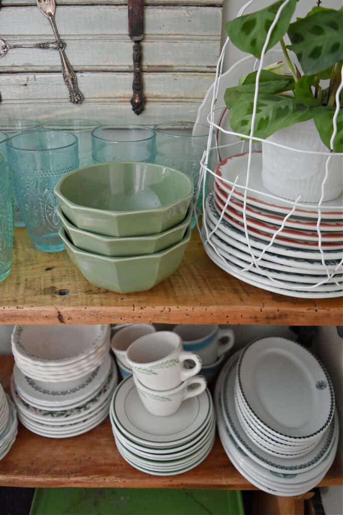 Kitchen open shelves with hotelware collection.