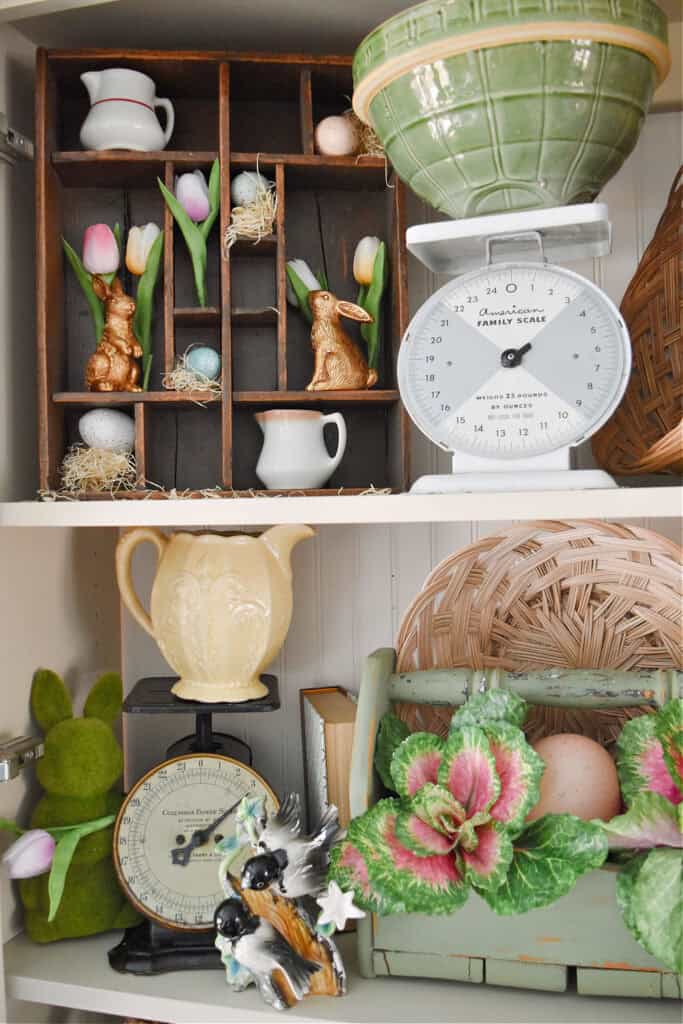 Spring decorated shelves with vintage finds.