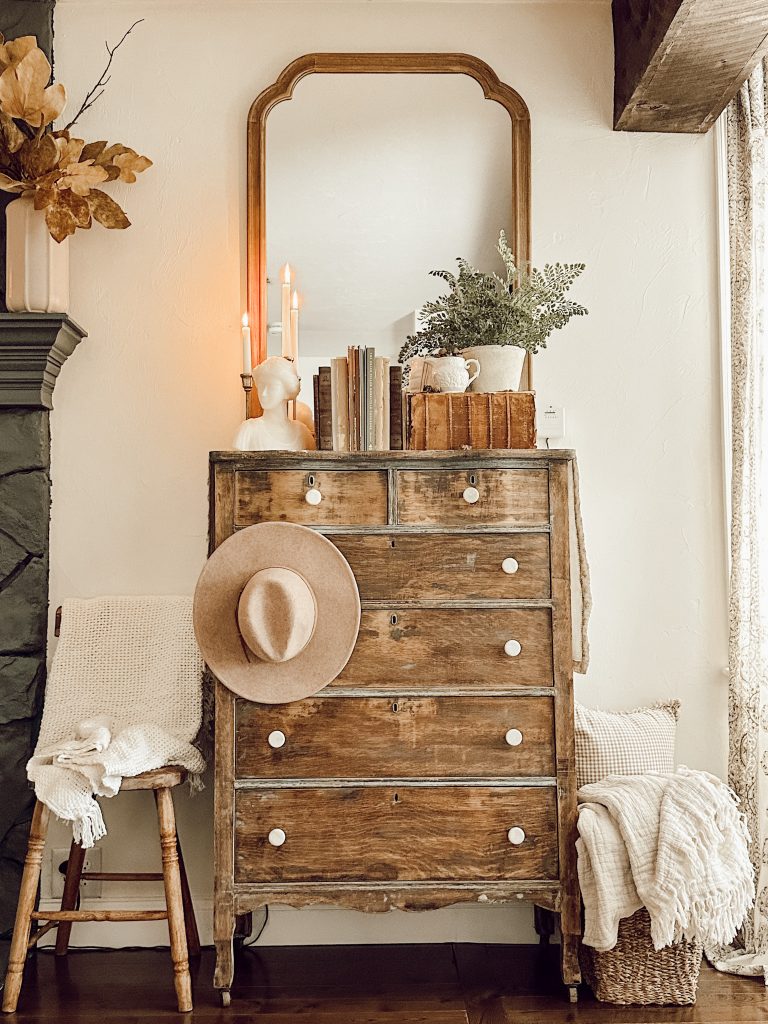 Rustic vintage Dresser with neutral decor.
