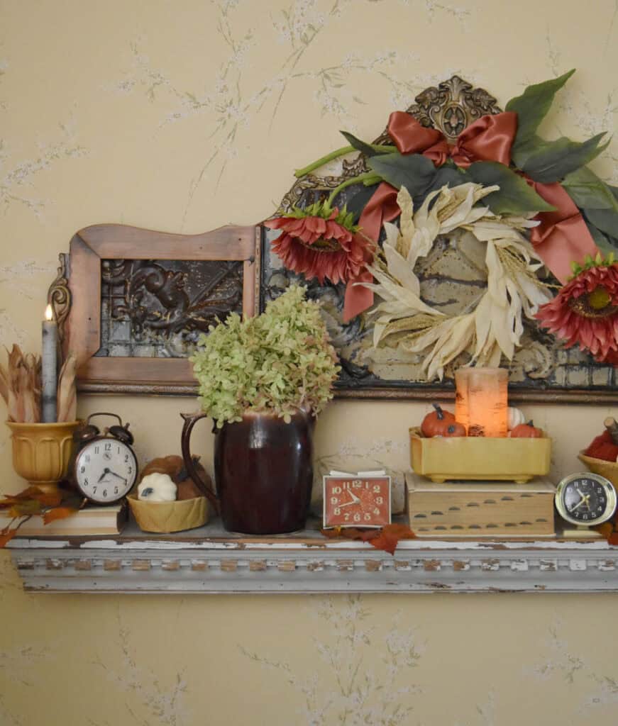 Fall shelf display with vintage finds.