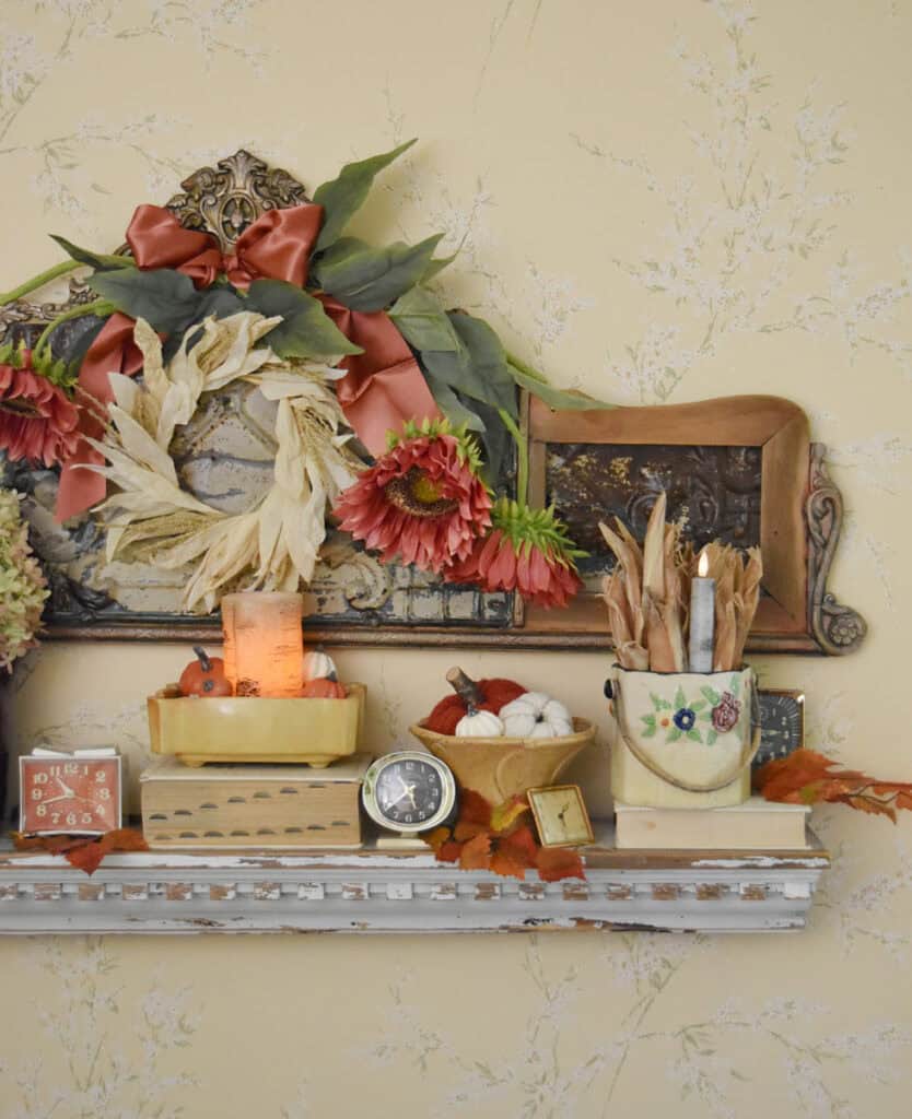 Fall shelf display with vintage finds.