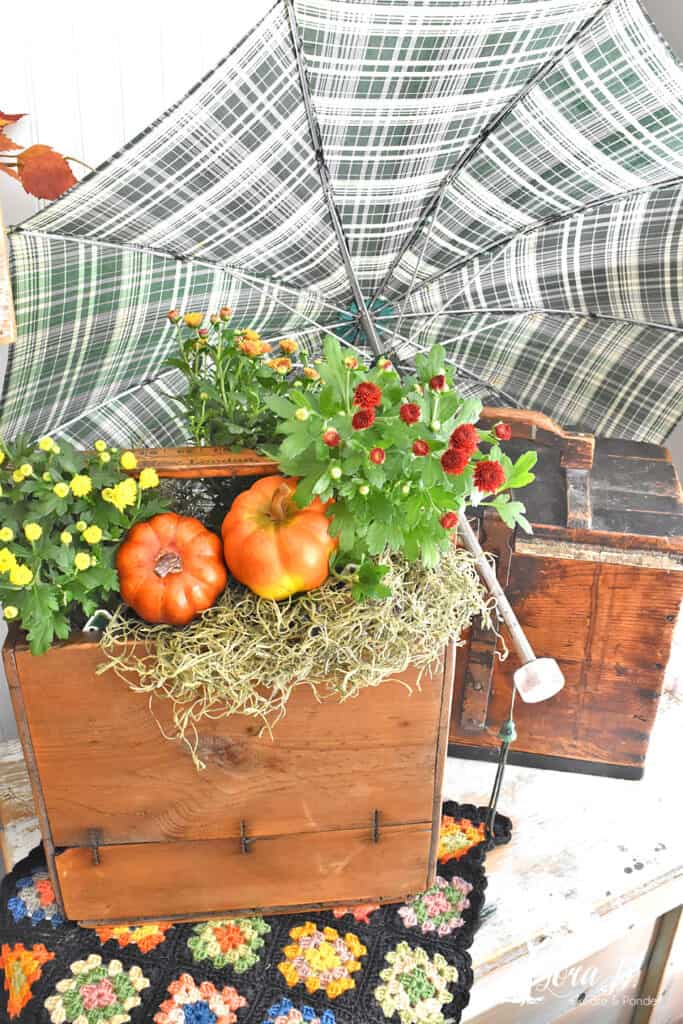 Vintage plaid umbrella is a fun decor item for a Fall Mantel display.