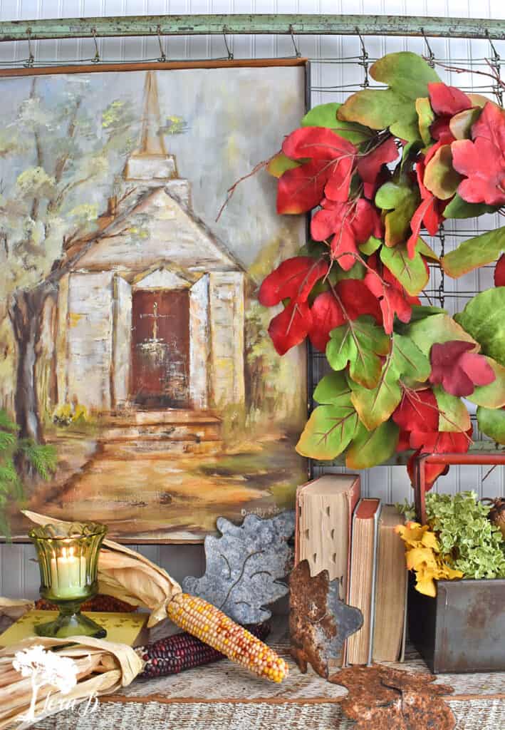 Handpainted old church art is the foundation for this Fall Mantel display.