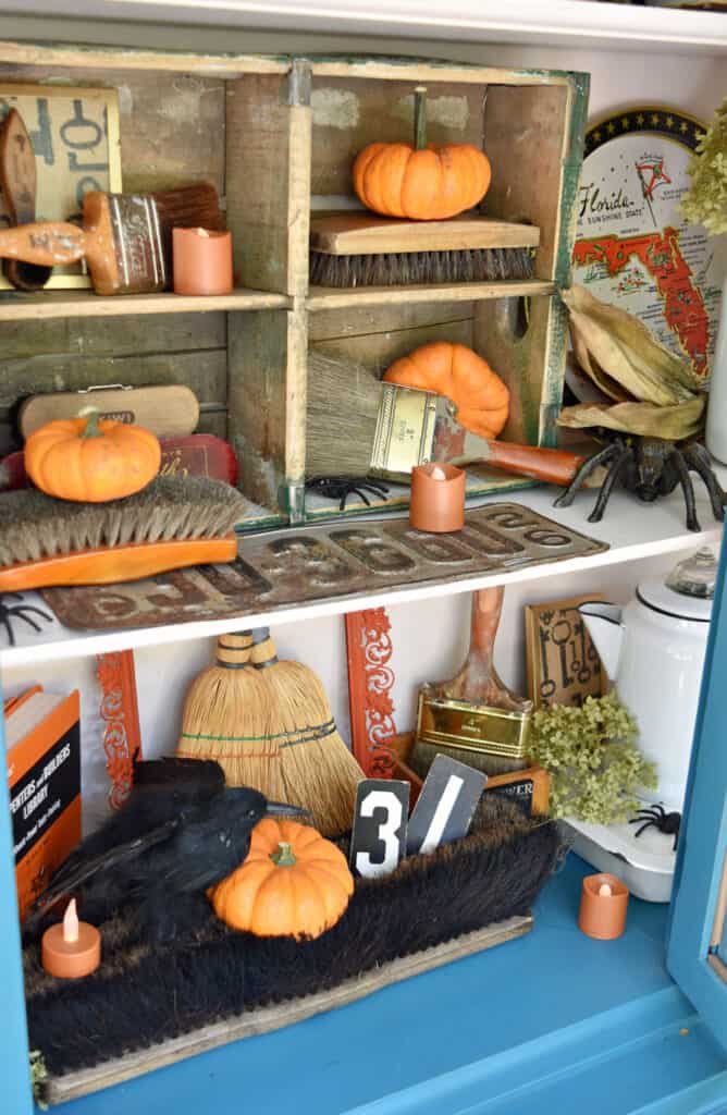 Old cleaning brushes collection as Fall decor.