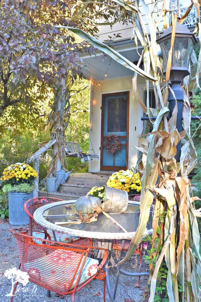 Fall decorated porch and patio with salvaged style.