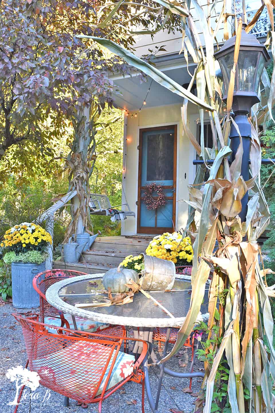 Fall Decorated Porch and Patio with Salvaged Style