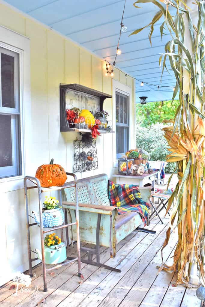 Fall decorated porch and patio with salvaged style.