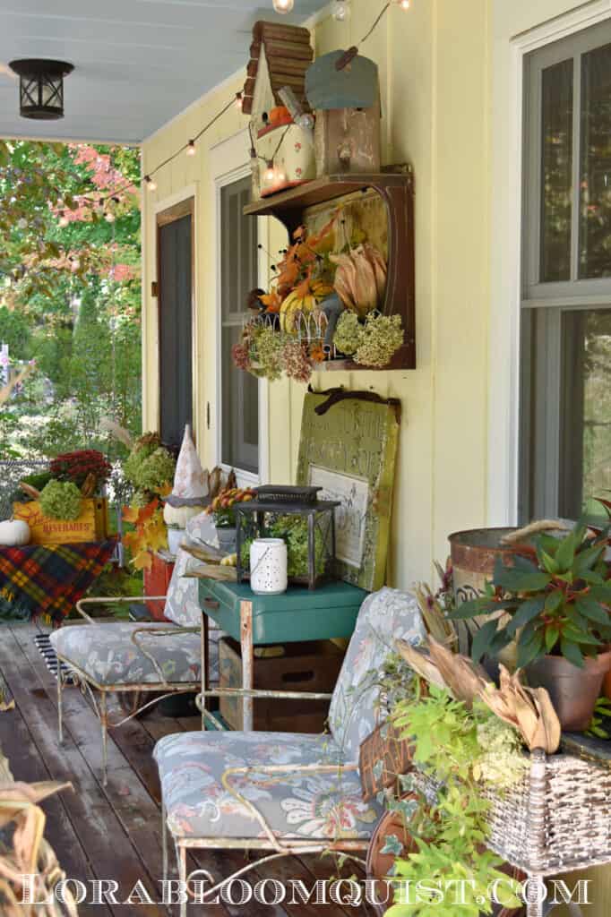 Vintage farmhouse Fall porch decor with upcycled DIY projects.